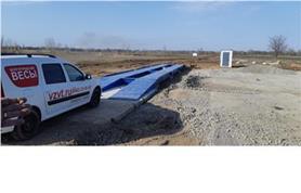 Автомобильные весы на дорожных плитах в поле (автовесы ВАЛ до 80 тонн, длинна ГПУ 18 метров)